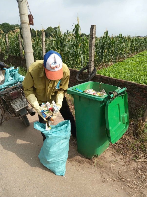 A person putting garbage in a bag  AI-generated content may be incorrect.
