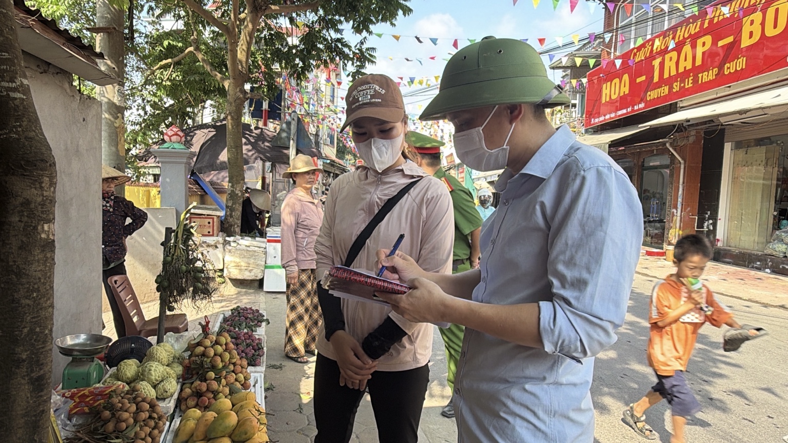 Xã Trần Phú ra quân giai đoạn 1 tuyên truyền, ký cam kết bảo đảm trật tự đô thị, an toàn giao thông- Ảnh 1.