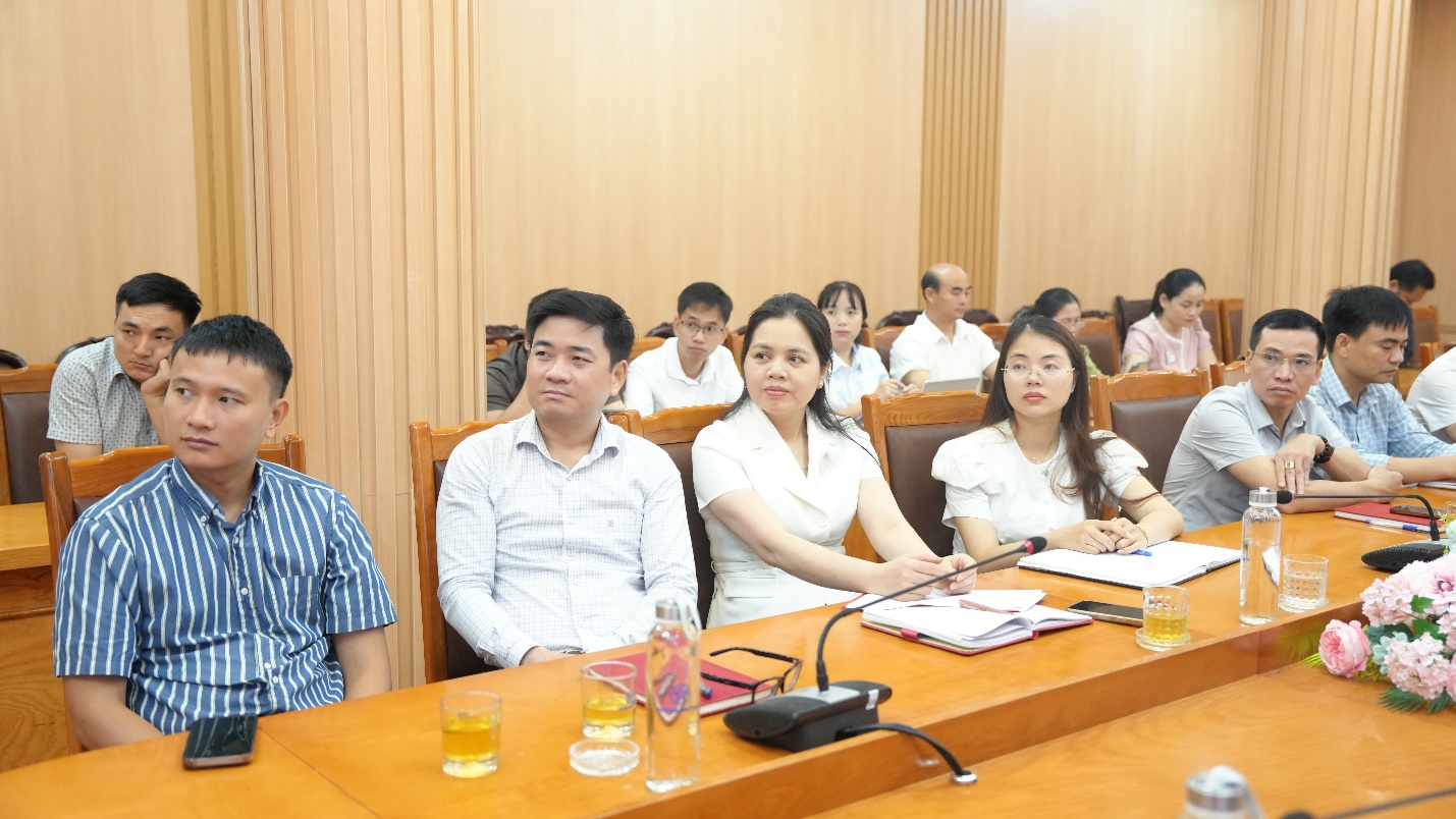 A group of people sitting at a table  AI-generated content may be incorrect.