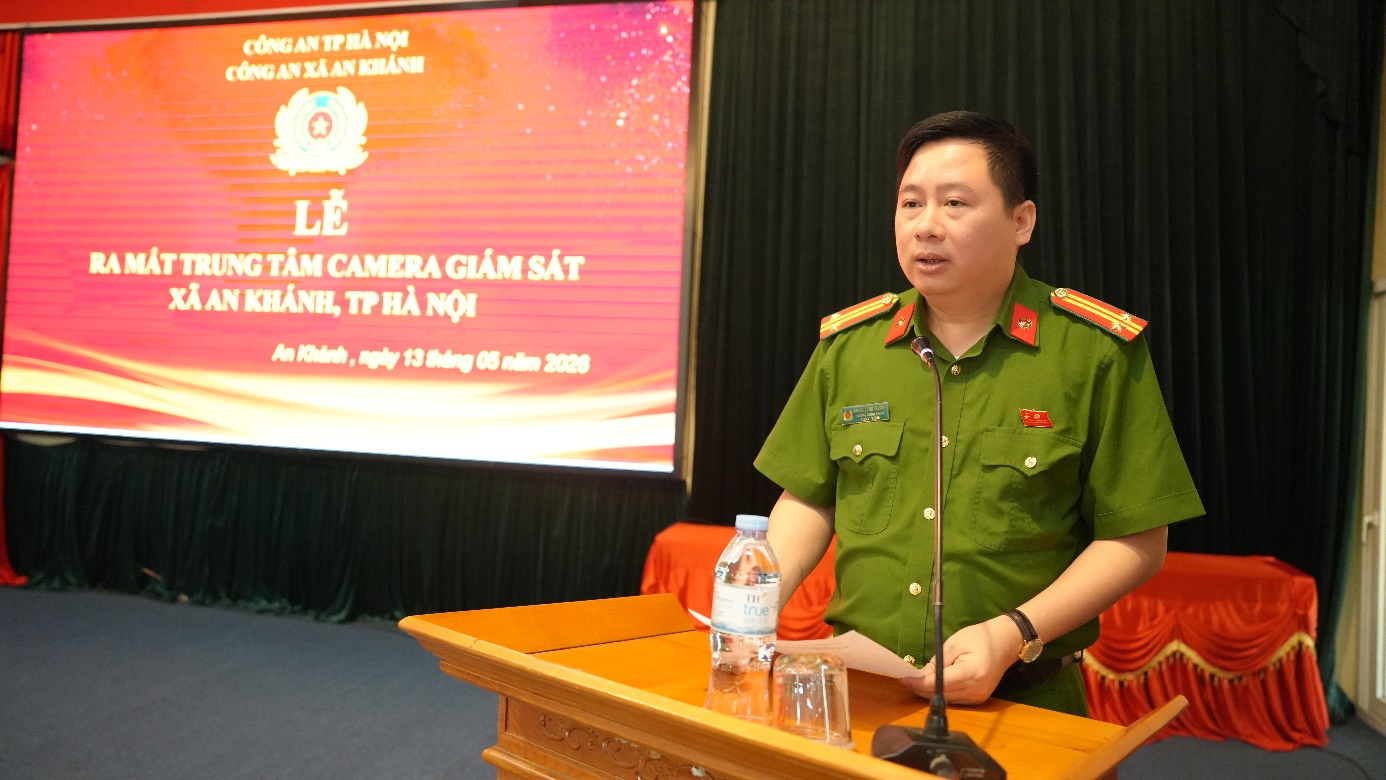 A person in uniform sitting at a podium  AI-generated content may be incorrect.
