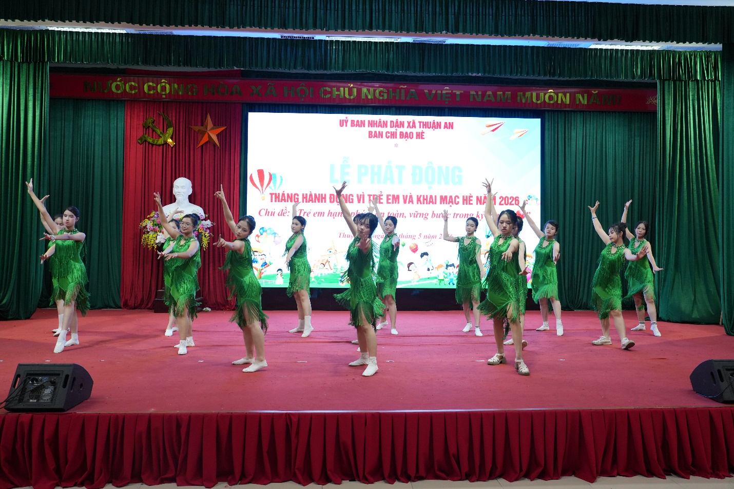 A group of girls dancing on a stage  AI-generated content may be incorrect.
