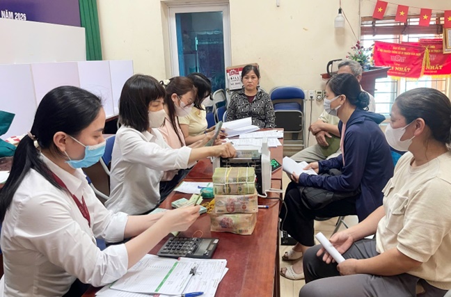 Hoài Đức chi trả tiền bồi thường, hỗ trợ cho các hộ dân có đất thu hồi thực hiện dự án- Ảnh 3.