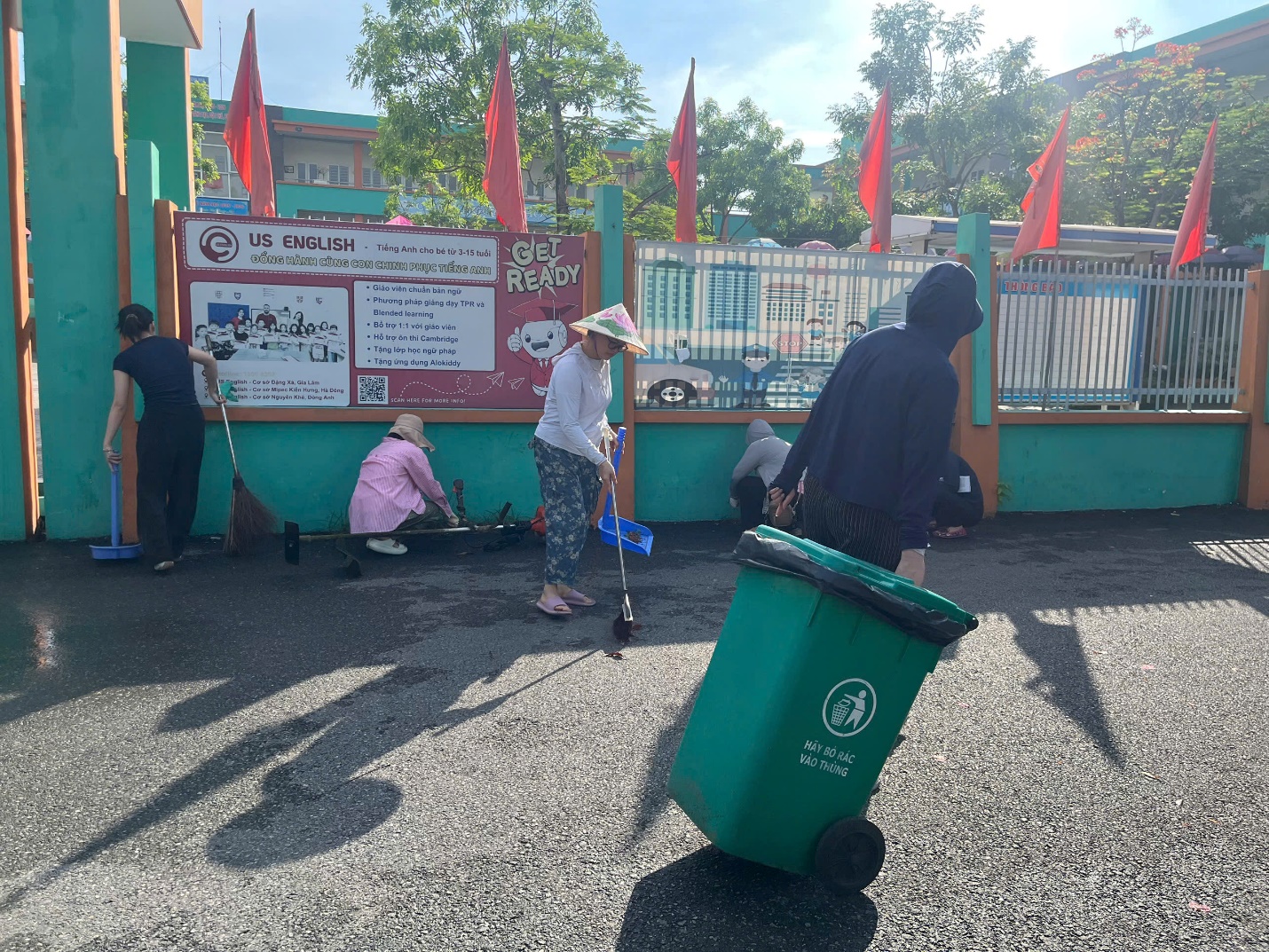 A group of people cleaning a park  AI-generated content may be incorrect.