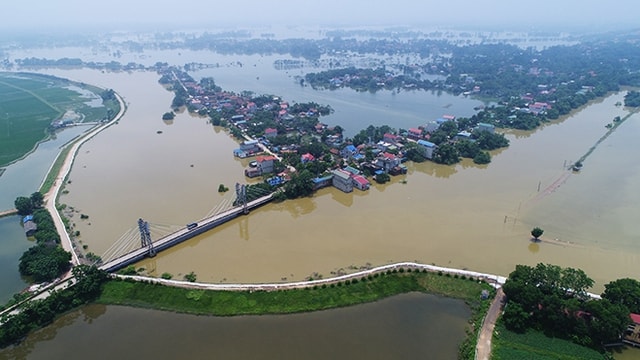 Hà Nội yêu cầu các xã, phường chủ động ứng phó lũ lên trên các sông- Ảnh 1.