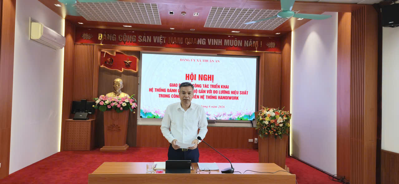 A person standing in front of a podium  AI-generated content may be incorrect.
