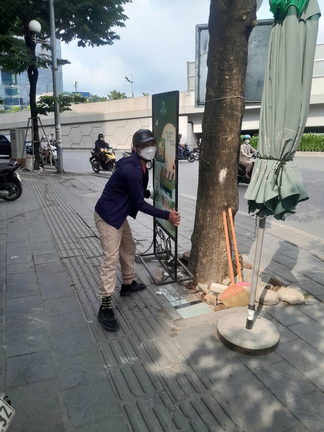 Phường Cầu Giấy ra quân xử lý vi phạm trật tự đô thị trên tuyến phố Trần Quốc Hoàn- Ảnh 3.