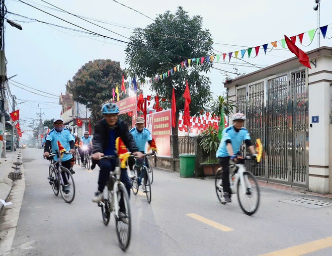 Diễu hành đạp xe tuyên truyền Bầu cử đại biểu Quốc hội khóa XVI và đại biểu Hội đồng nhân dân các cấp nhiệm kỳ 2026–2031- Ảnh 1.