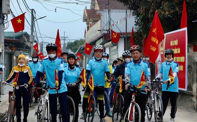 Diễu hành đạp xe tuyên truyền Bầu cử đại biểu Quốc hội khóa XVI và đại biểu Hội đồng nhân dân các cấp nhiệm kỳ 2026–2031- Ảnh 2.