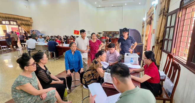 Xã Hồng Vân đẩy nhanh tiến độ chi trả tiền bồi thường, hỗ trợ giải phóng mặt bằng dự án Khu đô thị thể thao Olympic- Ảnh 1.