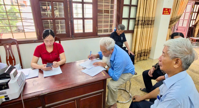 Xã Hồng Vân đẩy nhanh tiến độ chi trả tiền bồi thường, hỗ trợ giải phóng mặt bằng dự án Khu đô thị thể thao Olympic- Ảnh 2.