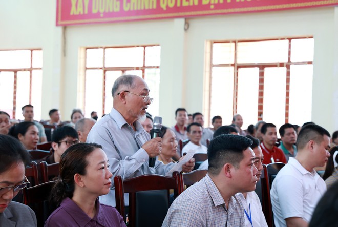 XÃ TRUNG GIÃ: TỔ CHỨC ĐỐI THOẠI VỚI CÁC HỘ DÂN LIÊN QUAN ĐẾN DỰ ÁN DI DÂN VÙNG ẢNH HƯỞNG MÔI TRƯỜNG BÃI RÁC NAM SƠN- Ảnh 1.