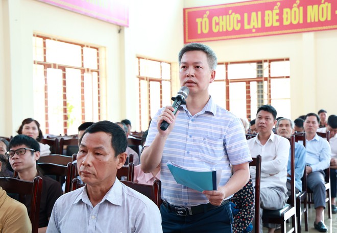 XÃ TRUNG GIÃ: TỔ CHỨC ĐỐI THOẠI VỚI CÁC HỘ DÂN LIÊN QUAN ĐẾN DỰ ÁN DI DÂN VÙNG ẢNH HƯỞNG MÔI TRƯỜNG BÃI RÁC NAM SƠN- Ảnh 2.