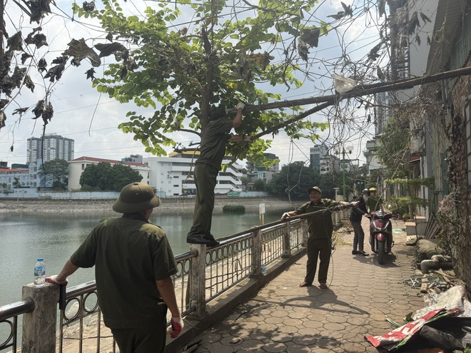 Phường Khương Đình triển khai giải tỏa vi phạm trật tự đô thị và vệ sinh môi trường khu vực hồ Hạ Đình- Ảnh 3.