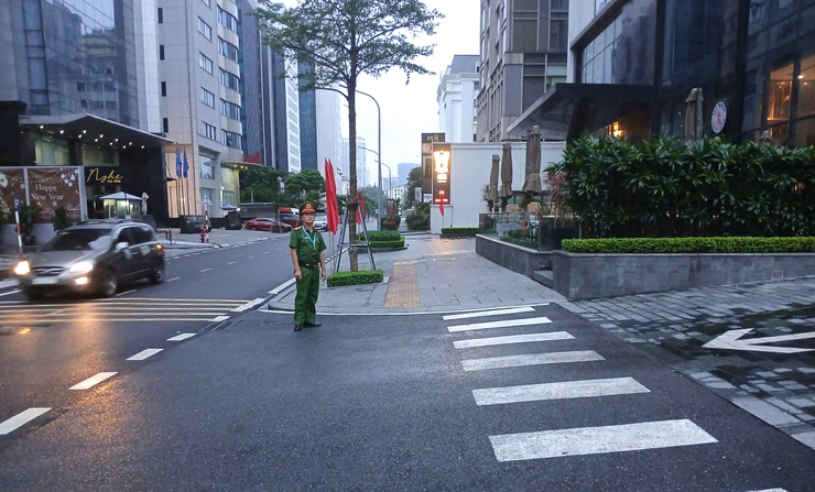 A person standing on a street  AI-generated content may be incorrect.