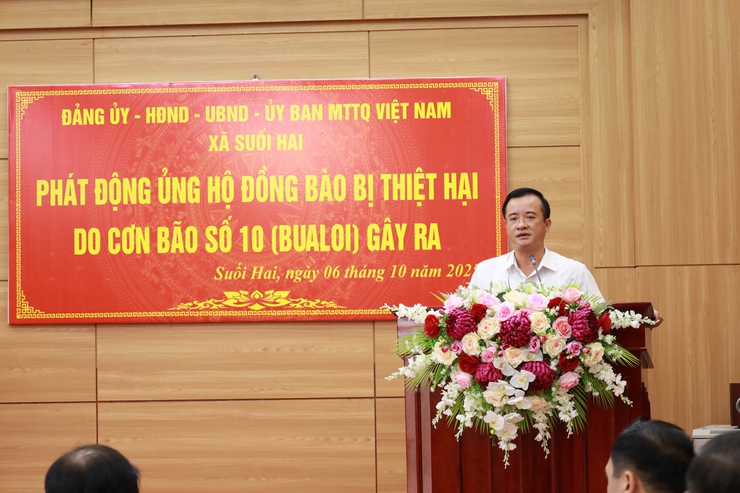 Xã Suối Hai tổ chức Lễ chào cờ đầu tuần và phát động ủng hộ đồng bào bị ảnh hưởng bởi bão số 10 (Bualoi)- Ảnh 2.