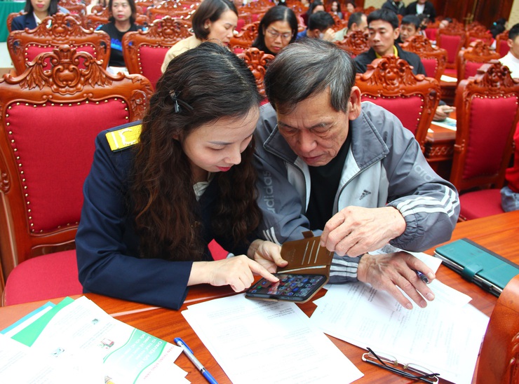 Thạch Thất: triển khai hội nghị chuyển đổi mô hình quản lý thuế đối với hộ kinh doanh- Ảnh 2.