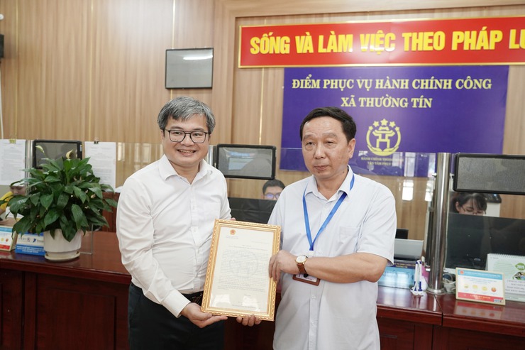 Thường Tín nâng cao hiệu quả cải cách hành chính, hướng tới phục vụ Nhân dân chuyên nghiệp, hiện đại- Ảnh 1.