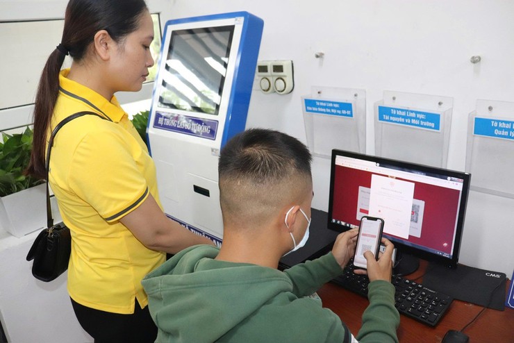 Ghi nhận ngày đầu tiên vận hành chính quyền 2 cấp ở Thuận An- Ảnh 3.