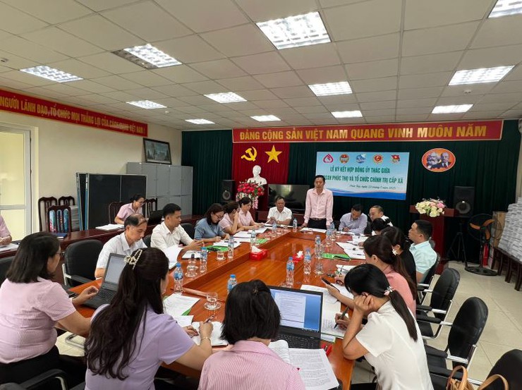 Phòng giao dịch NHCSXH Phúc Thọ ký kết Hợp đồng ủy thác với các tổ chức chính trị-xã hội 3 xã Phúc Thọ, Hát Môn và Phúc Lộc- Ảnh 1.