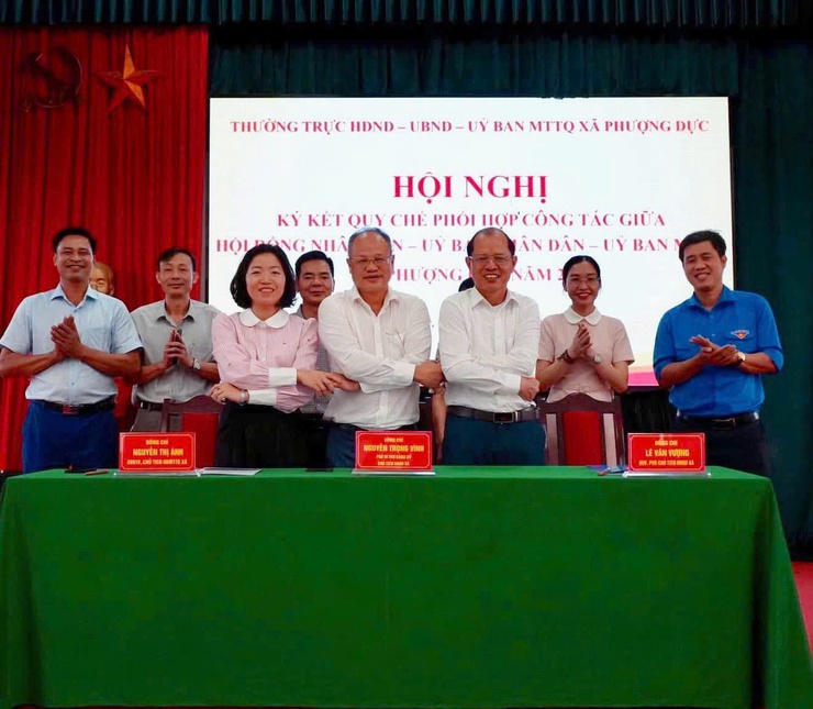 Hội nghị ký kết quy chế phối hợp công tác giữa HĐND-UBND-Uỷ ban MTTQ xã Phượng Dực năm 2025- Ảnh 2.