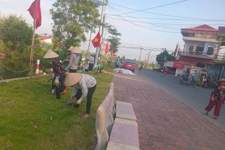 Rực rỡ cờ hoa chào mừng Đại hội đại biểu Đảng bộ xã- Ảnh 14.