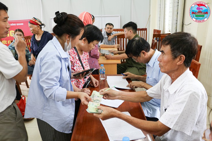 Xã Hưng Đạo triển khai chi trả quà tặng nhân dân nhân dịp Quốc khánh 2/9- Ảnh 12.