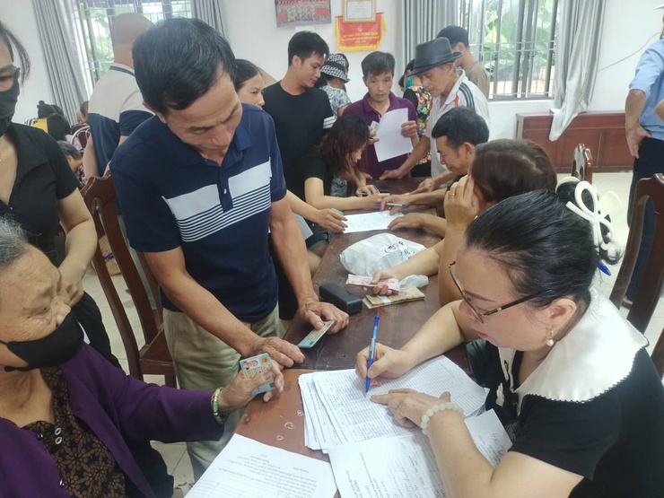 Người dân xã Bình Minh phấn khởi nhận quà mừng 80 năm Quốc khánh 2/9- Ảnh 4.