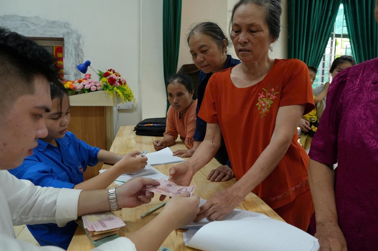 100.000 đồng và lòng dân- Ảnh 1.