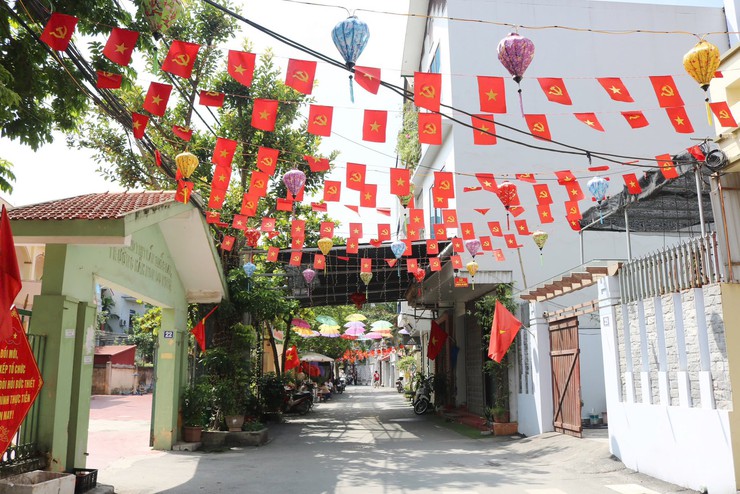 Xã Quốc Oai rực rỡ trang hoàng, sôi nổi thi đua chào mừng Đại hội đại biểu toàn quốc lần thứ XIV của Đảng- Ảnh 10.