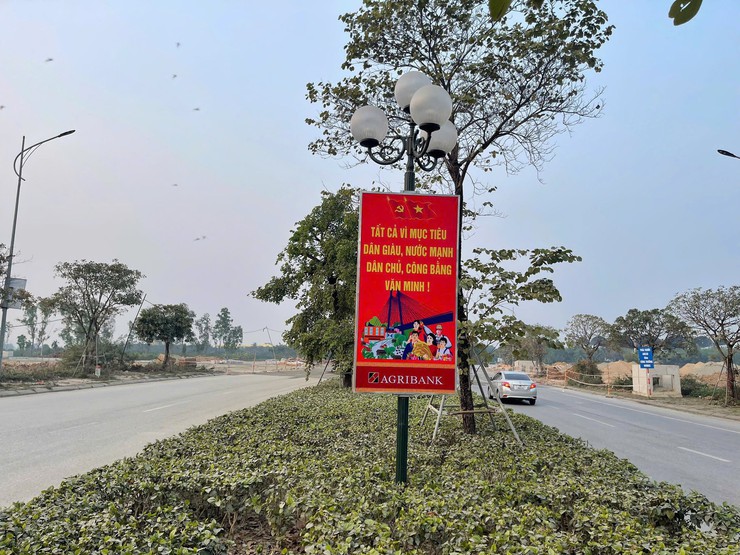 Xã Quốc Oai rực rỡ trang hoàng, sôi nổi thi đua chào mừng Đại hội đại biểu toàn quốc lần thứ XIV của Đảng- Ảnh 9.