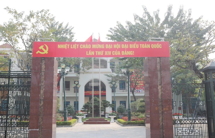 Xã Quốc Oai rực rỡ trang hoàng, sôi nổi thi đua chào mừng Đại hội đại biểu toàn quốc lần thứ XIV của Đảng- Ảnh 1.