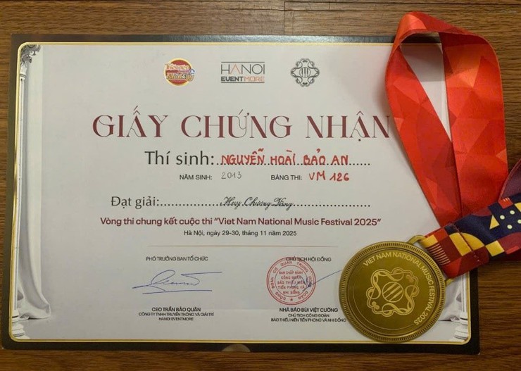 Nguyễn Hoài Bảo An - cô học trò nhỏ say mê đàn tranh của trường THCS Hoàng Liệt- Ảnh 2.