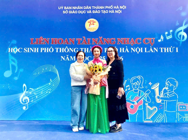 Nguyễn Hoài Bảo An - cô học trò nhỏ say mê đàn tranh của trường THCS Hoàng Liệt- Ảnh 5.