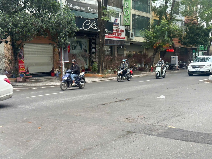 Ngày 11/2, đón không khí lạnh tăng cường, miền Bắc và Hà Nội trời mưa rét.- Ảnh 1.