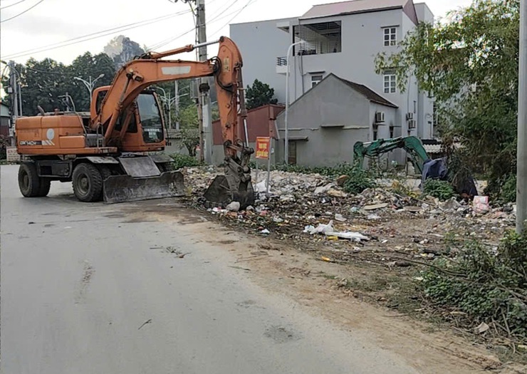 XÃ QUỐC OAI RA QUÂN TỔNG VỆ SINH MÔI TRƯỜNG, HUY ĐỘNG TỐI ĐA PHƯƠNG TIỆN, MÁY MÓC ĐÓN TẾT NGUYÊN ĐÁN- Ảnh 1.