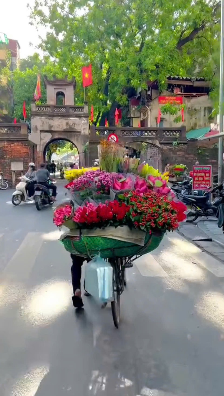 Hà Nội ngày 20/2 (mùng 4 Tết): nhiều mây, có mưa nhỏ vài nơi, sáng sớm có sương mù nhẹ rải rác. Sáng và đêm trời rét.- Ảnh 1.