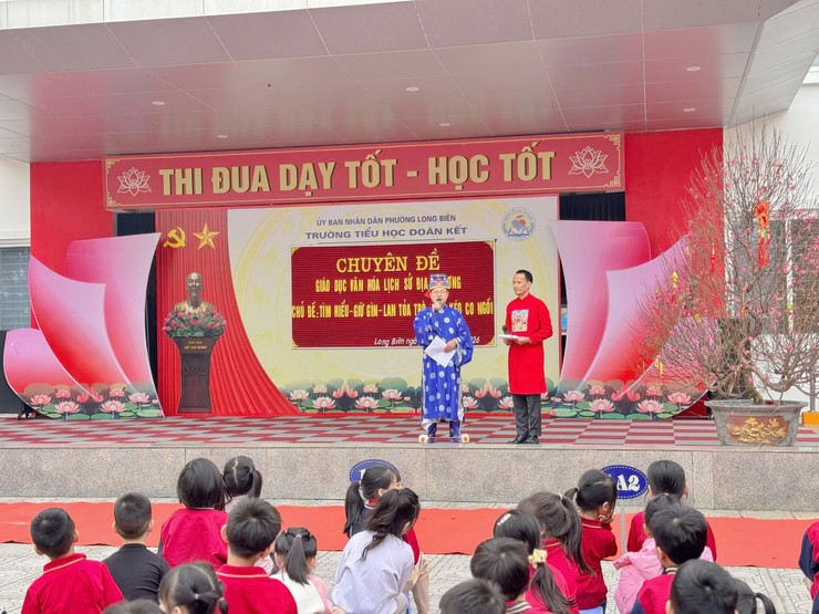 Trường Tiểu học Đoàn Kết lan tỏa giá trị kéo co ngồi truyền thống- Ảnh 2.