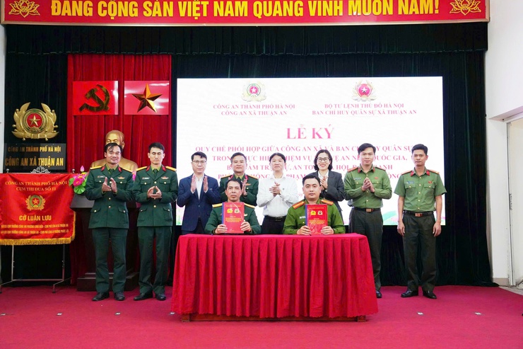 Công an xã và Ban Chỉ huy Quân sự xã Thuận An ký kết quy chế phối hợp- Ảnh 8.