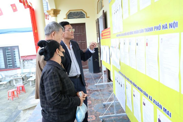 Cử tri Xuân Mai phấn khởi tham gia ngày hội bầu cử tại khu vực bỏ phiếu số 24, 25.- Ảnh 8.