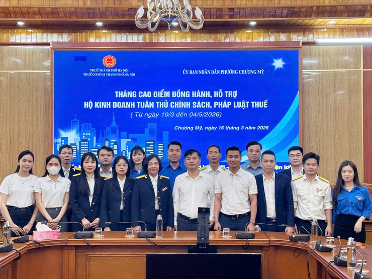 Lễ ra quân tháng cao điểm đồng hành, hỗ trợ hộ kinh doanh tuân thủ chính sách, pháp luật thuế trên địa bàn phường Chương Mỹ- Ảnh 1.