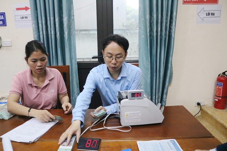 Quốc Oai chi trả hơn 25,3 tỷ đồng bồi thường GPMB dự án mở rộng nghĩa trang Nhân dân Bãi Hoàng Xã- Ảnh 3.