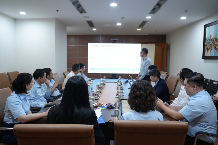 Trung tâm Phục vụ hành chính công Hà Nội trao đổi kinh nghiệm với Đoàn thành phố Đà Nẵng về triển khai hệ thống trạm số hóa- Ảnh 1.