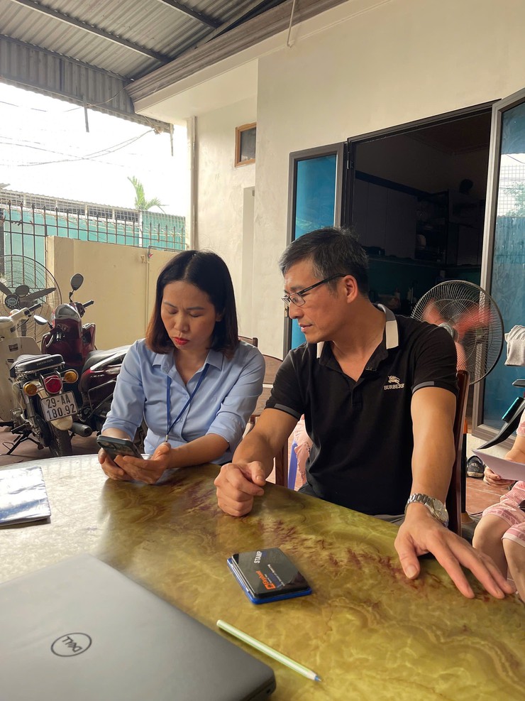 Phúc Thọ triển khai hỗ trợ giải quyết thủ tục hành chính tại nhà cho người dân yếu thế- Ảnh 1.