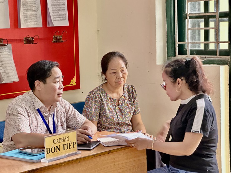 Hội đồng bồi thường GPMB xã Đại Thanh tổ chức chi trả khoảng 25 tỷ đồng cho 89 hộ dân thôn Huỳnh Cung có đất nằm trong chỉ giới dự án khu đô thị thể thao Olympic.- Ảnh 3.