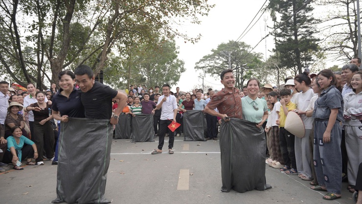 Giữ lửa truyền thống từ lễ hội đua trải thôn Hữu Vĩnh- Ảnh 1.