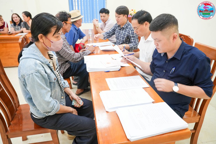 Xã Hưng Đạo tổ chức chi trả bồi thường, hỗ trợ cho các hộ dân thuộc dự án Trạm biến áp 500kV Tây Hà Nội- Ảnh 2.