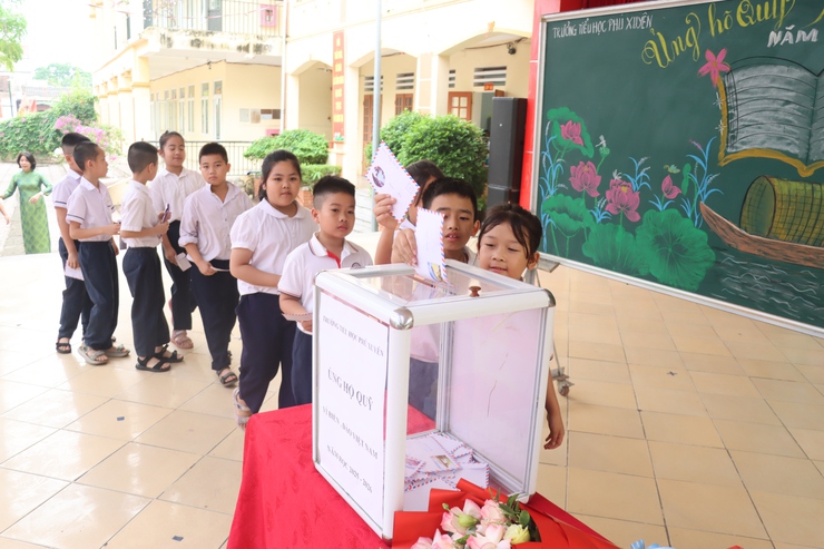 Ấn tượng chương trình “Ngày hội môi trường xanh – lan tỏa văn hóa đọc” tại trường tiểu học Phú Xuyên- Ảnh 4.