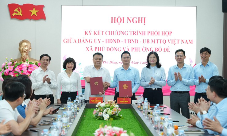 PHƯỜNG BỒ ĐỀ - XÃ PHÙ ĐỔNG KẾT NGHĨA, KÝ CHƯƠNG TRÌNH PHỐI HỢP TOÀN DIỆN- Ảnh 1.
