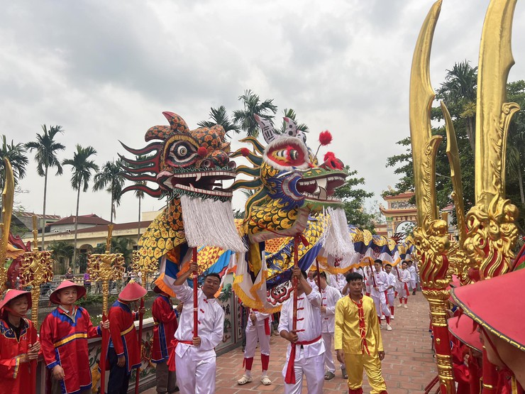 Rộn ràng lễ hội truyền thống giao hảo thôn Trần Đăng (Ứng Thiên) – Áng Phao (Dân Hòa)
- Ảnh 3.