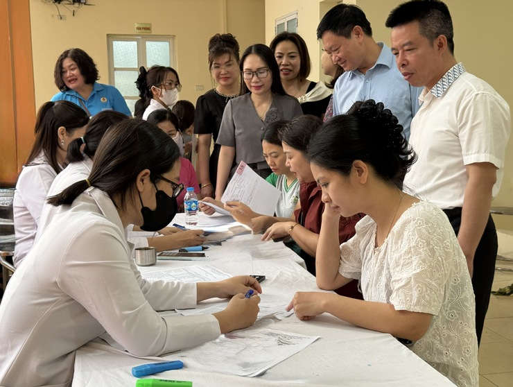 Đẩy mạnh các hoạt động chăm sóc sức khỏe về tận cơ sở, lấy người dân làm trung tâm- Ảnh 1.